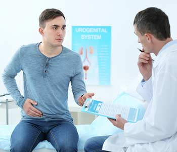 Patient talking with doctor at hospital